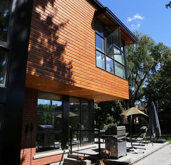 Cedar cantilevered modern addition