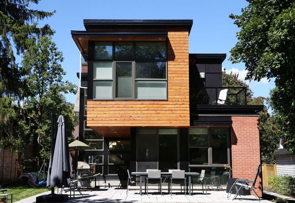 Cedar addition rear elevation with patio